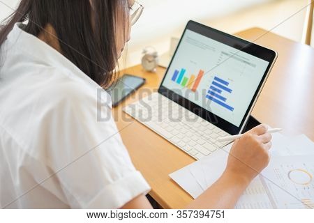 Work From Home Young Freelancer Or Businessman Working At Home Office With Smartphone Tablet. Workin