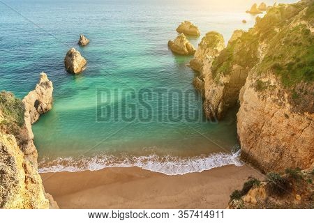 A Beautiful Bay Landscape On The Portuguese Beach Of Boiao, A Clear Blue Turquoise Sea. Algarve