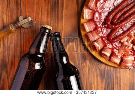 Beer Snack In The Form Of Meat Products And Bottled Beer. Appetizer In The Form Of Slicing Bacon, Sa