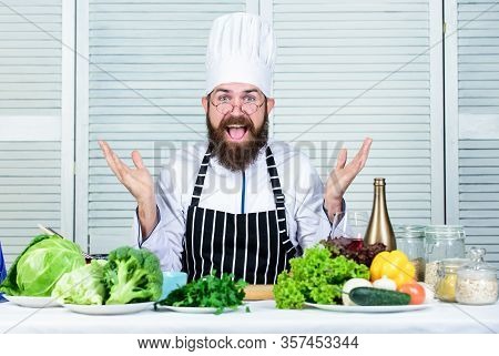 Vegetarian Salad With Fresh Vegetables. Healthy Food Cooking. Mature Hipster With Beard. Happy Beard