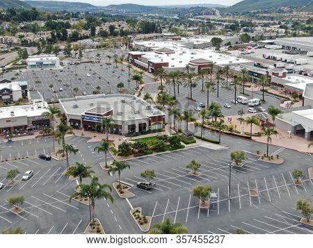 Aerial View Of Empty Shopping Center Parking Lot During Covid-19 Pandemic.. Coronavirus Virus And Pa