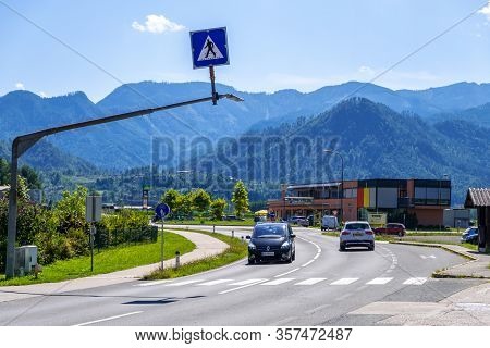 Carinthia, Austria - August 09, 2019: Road In Countryside With Alpine Hills In Carinthia, Austria