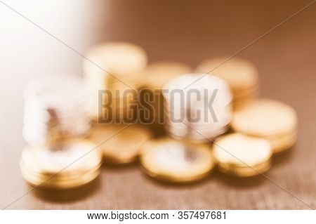 Coins In Golden Texture, Blurred Image For Image Background Use. Golden Concept, Luxury, Wealth, Gol