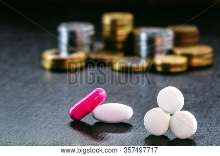 Private Health And Costs, Compressed Together With Double-currency Money, Coins Of One Real. Concept