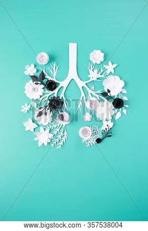 Foci In The Lungs In The Form Of Flowers Made Of Black Paper Against The Background Of Light White F