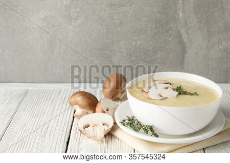 Mushroom Cream Soup On Wooden Background, Space For Text