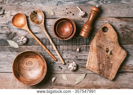 Wooden Kitchen Utensils On Wooden Background. Top View. Copy Space. Food Preparing Concept. Bowls, S