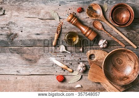 Wooden Kitchen Utensils On Wooden Background. Top View. Copy Space. Food Preparing Concept. Bowls, S