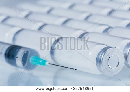 Medicine, Injection, Vaccine And Disposable Syringe, Drug Concept. Sterile Vial Medical Syringe Need