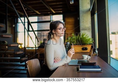 Thoughtful Woman Professional Web Content Writer Or Publication Specialist Thinking About New Work I