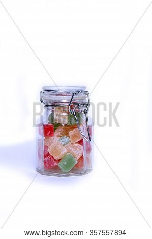 Glass Can Of Turkish Delight With Swing Stoppe Isolated On White Background. Vertical Image. Image C