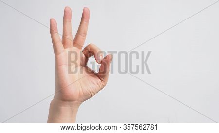 Male Moedl Is Doing A-ok  Hand Sign On White Background.