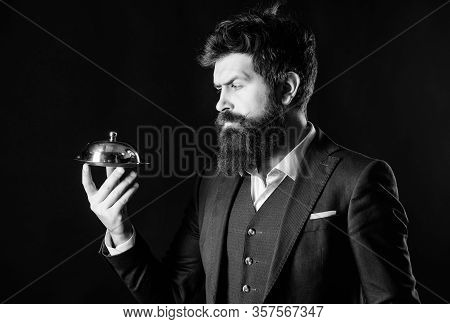 Something Special. Man Well Groomed Bearded Gentleman Formal Suit Hold Little Cloche. Serving And Pr