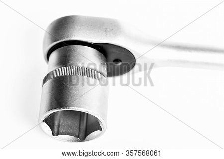 Useful Tools Concept. Auto Repair Shops. Knob For Socket Wrench Nut Ratchet Close Up White Backgroun