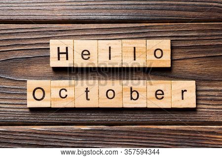 Hello October Word Written On Wood Block. Hello October Text On Table, Concept