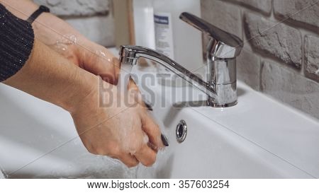 Hand Hygiene. How To Wash Your Hands With Soap And Water. Women Washing Hands With Antibacterial Soa