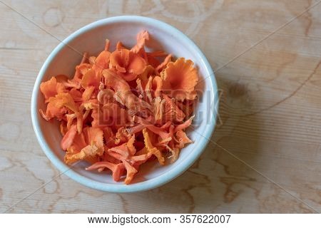 Bowl Of Red And Orange Cinnabar Chanterelle Mushrooms, Organic Food Ingredient, Horizontal Aspect