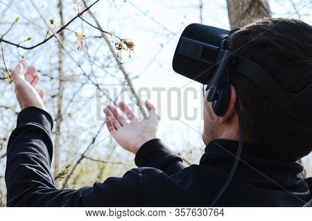 Young Man Try Vr Glasses, Virtual Technologies Help People In Realistic Wildlife Vision