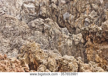 Madeira Volcanic Rocks. Porto Moniz Geology Texture. Lava Stone Cliff. Porous Magma Structure Patter