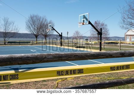 Closed basketball court at Scenic Hudson Park in Irvington, NY, USA on March 21, 2020. According to Gov. Andrew Cuomo, New Yorkers must practice social distancing due to the coronavirus outbreak.