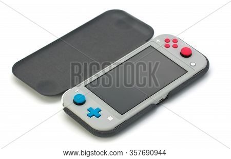 Moscow, Russia - February 18, 2020: Grey Nintendo Switch Lite On White Background. Latest Entry Into