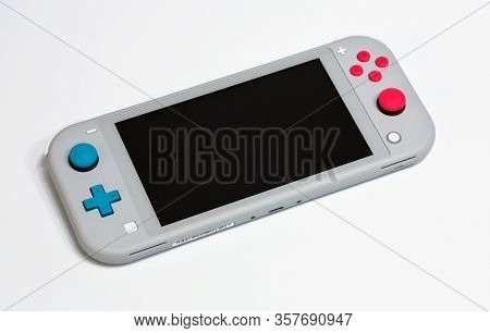 Moscow, Russia - February 18, 2020: Grey Nintendo Switch Lite On White Background. Latest Entry Into