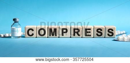 Compress - Text On Cubes. Drug In Ambula, Tablets In Blisters To Reduce Disease Symptoms