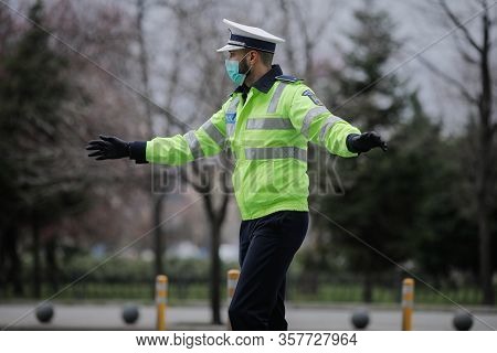 Romanian Road Police Officer Pulls Over A Car To Check For The Driver’s Identity Papers.