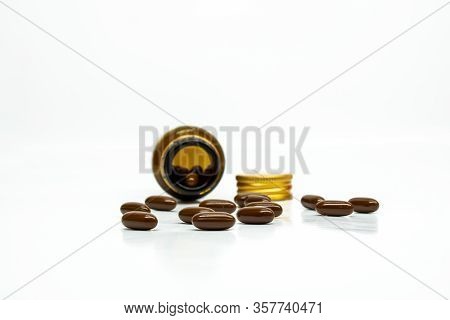 Multivitamin Softgel Capsules With Blurred Bottle With A Room For Text