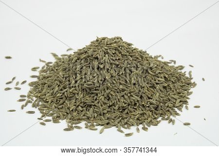 Raw Cumin Seeds Isolated On White Background