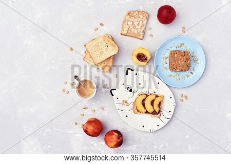 Toast With Peanut Butter, Nectarine And Almonds. Tasty And Healthy Breakfast.