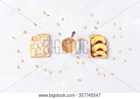 Toast Snack With Peanut Butter, Nectarine And Almonds. Tasty And Healthy Breakfast. Snack.
