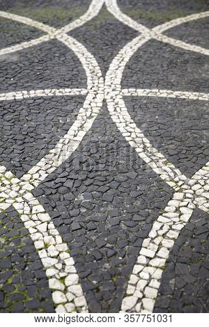 Closeup Surface Of The Blocky Pattern Old Stone Pavement