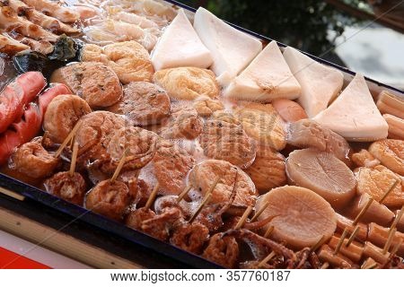 Tokyo Street Food. Japanese Cuisine - Oden Food In Soy Broth. Typical  Winter Food In Japan With Sau