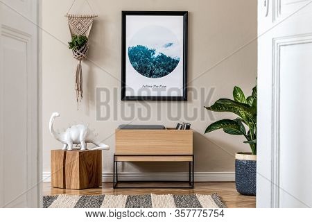 Modern Scandinavian Living Room Interior With Black Mock Up Poster Frame, Design Commode And Elegant