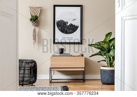 Modern Scandinavian Living Room Interior With Black Mock Up Poster Frame, Design Commode And Elegant