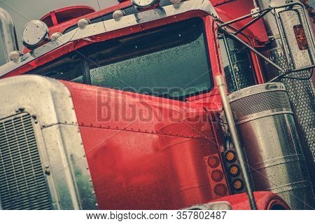 Semi Truck Pressure Washing. Clean Tractor Covered By Water. Closeup Photo