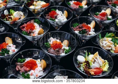 Salmon Caviar With Spoon On Gray Background