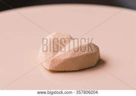 Close-up Of Confectioner Decorates The Cake With Velour Using The Spray Gun.