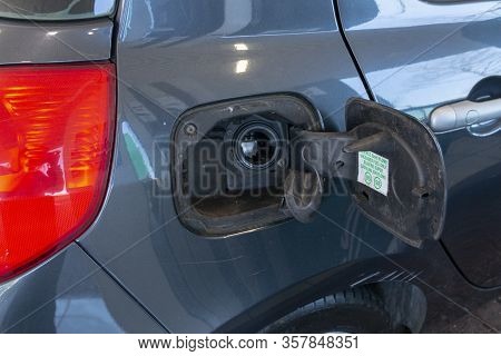 Bristol-march 2020-england-a Close Up View Of A Open Pertol Cap On The Side Of A Car At The Petrol S