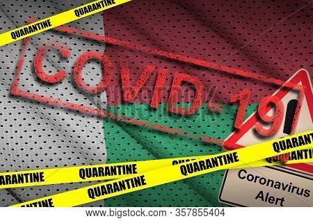 Madagascar Flag And Covid-19 Quarantine Yellow Tape With Red Stamp. Coronavirus Or 2019-ncov Virus