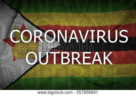 Zimbabwe Flag And Coronavirus Outbreak Inscription. Covid-19 Or 2019-ncov Virus