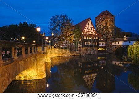 Nuremberg city houses on riverside of Pegnitz river from Maxbrucke (Max bridge). Nuremberg, Franconia, Bavaria, Germany