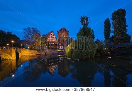 Nuremberg city houses on riverside of Pegnitz river from Maxbrucke (Max bridge). Nuremberg, Franconia, Bavaria, Germany