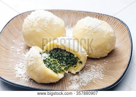 potato dumplings filled with spinach