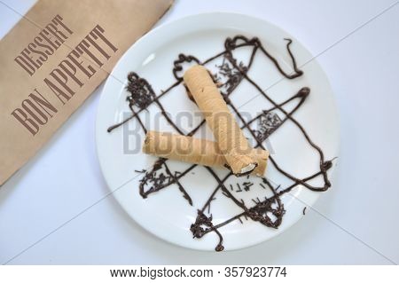Wafer Roll With Condened Milk. Coffee Desserts. Delicious Dessert With Coffee.
