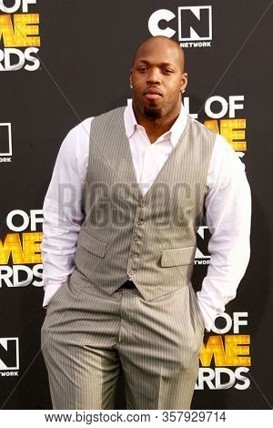 LOS ANGELES - FEB 18:  Terrell Suggs at the 2012 Cartoon Network Hall of Game Awards at the Barker Hanger on February 18, 2012 in Santa Monica, CA