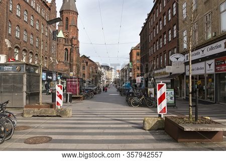 Aarhus, Denmark - 24 March 2020:  The Pedestrian Street In Aarhus With Closed Shops On Both Sides Of