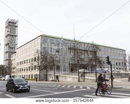 Aarhus, Denmark - 24 March 2020:  Aarhus City Hall With The Famous Tower Clock In The Background