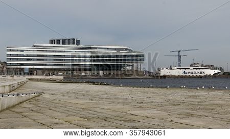 Aarhus, Denmark - 24 March 2020:  Navitas Building On The Left In The Picture And Molsliniens Expres